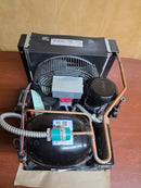 Copeland M4FF-0056-IAA-040 top view with compressor, receiver, pressure control and Emerson controller